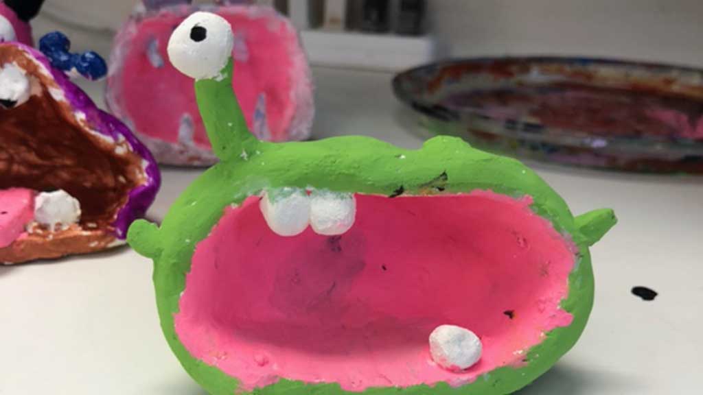 A one-eyed mouth monster created by a young student in our 5-7 year old class
